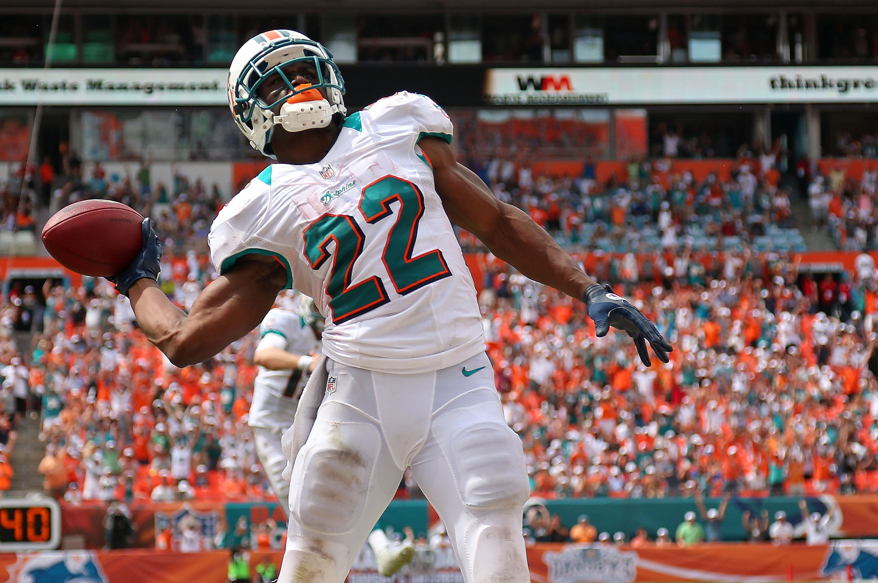 Miami Dolphins Reggie Bush runs into the end zone to score against the  Washington Redskins in the 4th quarter. The Miami Dolphins defeated the  Washington Redskins, 20-9, at Sun Life Stadium in