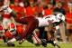 ATHENS, GA - SEPTEMBER 10: Marcus Lattimore #21 of the South Carolina Gamecocks dives for more yardage over Shawn Williams #36 of the Georgia Bulldogs at Sanford Stadium on September 10, 2011 in Athens, Georgia. (Photo by Kevin C. Cox/Getty Images)
