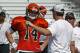 Jul 31, 2011; Georgetown, KY, USA; Cincinnati Bengals quarterback Andy Dalton (14) listens to offensive coordinator Jay Gruden during training camp at Georgetown College. Mandatory Credit: Frank Victores-US PRESSWIRE