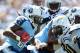 SAN DIEGO, CA - SEPTEMBER 16: Chris Johnson #28 of the Tennessee Titans carries the ball in front of Aubrayo Franklin #90 of the San Diego Chargers at Qualcomm Stadium on September 16, 2012 in San Diego, California. (Photo by Harry How/Getty Images)