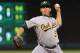 ARLINGTON, TX - SEPTEMBER 25: Tommy Milone #57 of the Oakland Athletics throws against the Texas Rangers at Rangers Ballpark in Arlington on September 25, 2012 in Arlington, Texas. (Photo by Rick Yeatts/Getty Images)