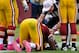 LANDOVER, MD - OCTOBER 07: Quarterback Robert Griffin III #10 of the Washington Redskins lays on the field after taking a hard hit against the Atlanta Falcons in the third quarter at FedExField on October 7, 2012 in Landover, Maryland. He left the game after the hit. (Photo by Patrick Smith/Getty Images)