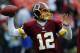 Oct 7, 2012; Landover, MD, USA; Washington Redskins quarterback Kirk Cousins (12) warms up before the game against the Atlanta Falcons at FedEX Field. Mandatory Credit: Brad Mills-US PRESSWIRE