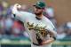 DETROIT, MI - OCTOBER 07: Ryan Cook #48 of the Oakland Athletics throws a pitch against the Detroit Tigers during Game Two of the American League Division Series at Comerica Park on October 7, 2012 in Detroit, Michigan. (Photo by Leon Halip/Getty Images)
