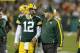 GREEN BAY, WI - SEPTEMBER 13: Aaron Rodgers #12 of the Green Bay Packers talks with head coach Mike McCarthy during a timeout in the first half against the Chicago Bears at Lambeau Field on September 13, 2012 in Green Bay, Wisconsin. (Photo by Joe Robbins/Getty Images)