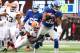 EAST RUTHERFORD, NJ - OCTOBER 07: Rueben Randle #82 of the New York Giants runs after a catch as D'Qwell Jackson #52 of the Cleveland Browns defends during their game at MetLife Stadium on October 7, 2012 in East Rutherford, New Jersey. (Photo by Al Bello/Getty Images)