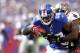 EAST RUTHERFORD, NJ - SEPTEMBER 16: Hakeem Nicks #88 of the New York Giants tries to break the tackle of Aqib Talib #25 of the Tampa Bay Buccaneers during a game at MetLife Stadium on September 16, 2012 in East Rutherford, New Jersey. (Photo by Jeff Zelevansky/Getty Images)