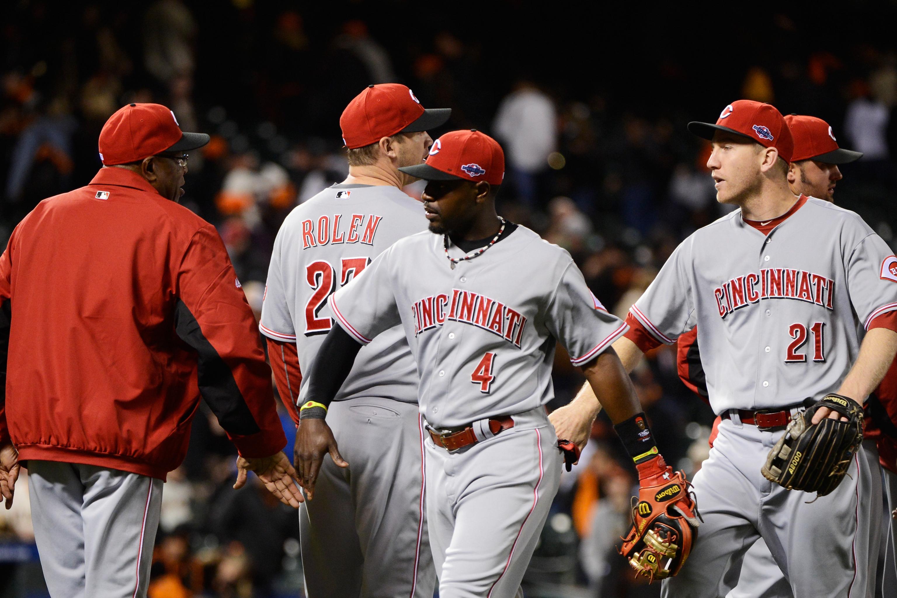 Reds take Game 1 against Giants, lose Johnny Cueto