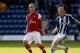 WEST BROMWICH, ENGLAND - OCTOBER 1: Jack Wilshere (L) of Arsenal in action with Sam Manton of West Bromwich during the Barclays Under-21 League match between West Bromwich Albion and Arsenal at The Hawthorns on October 1, 2012 in West Bromwich, England. (Photo by Paul Thomas/Getty Images)