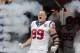 HOUSTON,TX - SEPTEMBER 09: J.J. Watt #99 of the Houston Texans is introduced to the crowd before playing the Miami Dolphins at Reliant Stadium on September 9, 2012 in Houston, Texas. (Photo by Bob Levey/Getty Images)