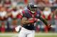 Sep 30, 2012; Houston, TX, USA; Houston Texans running back Ben Tate (44) runs the ball against the Tennessee Titans in the third quarter at Reliant Stadium. The Texans defeated the Titans 38-14. Mandatory Credit: Brett Davis-US PRESSWIRE