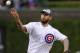 CHICAGO, IL - MAY 08: WWE Champion CM Punk throws out the first pitch before the Chicago Cubs versus the Atlanta Braves game on May 8, 2012 at Wrigley Field in Chicago, Illinois. (Photo by David Banks/Getty Images)