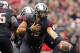 Oct 6, 2012; Piscataway, NJ, USA; Rutgers Scarlet Knights quarterback Gary Nova (15) hands the ball off during the second half against the Connecticut Huskies at High Point Solutions Stadium. Rutgers won 19-3. Mandatory Credit: Jim O'Connor-US PRESSWIRE