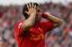 LIVERPOOL, ENGLAND - OCTOBER 07: Luis Suarez of Liverpool reacts during the Barclays Premier League match between Liverpool and Stoke City at Anfield on October 7, 2012 in Liverpool, England. (Photo by Clive Brunskill/Getty Images)