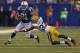 INDIANAPOLIS, IN - OCTOBER 07: Donald Brown #31 of the Indianapolis Colts breaks a tackle attempt by Sam Shields #37 of the Green Bay Packers at Lucas Oil Stadium on October 7, 2012 in Indianapolis, Indiana. The Colts defeated the Packers 30-27. (Photo by Jonathan Daniel/Getty Images)