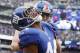 Oct 7, 2012; East Rutherford, NJ, USA; New York Giants running back Ahmad Bradshaw (44) celebrates his touchdown in the second quarter with teammate Bear Pascoe (86) against the Cleveland Browns. Mandatory Credit: Tim Farrell/THE STAR-LEDGER via US PRESSWIRE