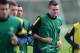 ST ALBANS, ENGLAND - OCTOBER 02: Carl Jenkinson of Arsenal warms up during an Arsenal training session ahead of the Uefa Champions League Group B match between Arsenal and Olympiacosat London Colney on October 2, 2012 in St Albans, England. (Photo by Mike Hewitt/Getty Images)