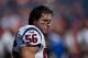 DENVER, CO - SEPTEMBER 23: Linebacker Brian Cushing #56 of the Houston Texans looks on before a game against the Denver Broncos at Sports Authority Field at Mile High on September 23, 2012 in Denver, Colorado. (Photo by Justin Edmonds/Getty Images)