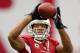 GLENDALE, AZ - SEPTEMBER 30: Wide receiver Larry Fitzgerald #11 of the Arizona Cardinals warms up before the NFL game against the Miami Dolphins at the University of Phoenix Stadium on September 30, 2012 in Glendale, Arizona. (Photo by Christian Petersen/Getty Images)