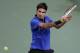 SHANGHAI, CHINA - OCTOBER 10: Roger Federer of Switzerland returns a shot to Yen-Hsun Lu of Chinese Taipei during the day four of Shanghai Rolex Masters at the Qi Zhong Tennis Center on October 10, 2012 in Shanghai, China. (Photo by Lintao Zhang/Getty Images)