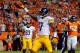 DENVER, CO - SEPTEMBER 09: Wide receiver Mike Wallace #17 of the Pittsburgh Steelers celebrates his 3 yard touchdown reception against the Denver Broncos in the fourth quarter at Sports Authority Field at Mile High on September 9, 2012 in Denver, Colorado. (Photo by Doug Pensinger/Getty Images)