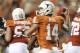 Oct 6, 2012; Austin, TX, USA; Texas Longhorns quarterback David Ash (14) throws a pass during the second quarter against the West Virginia Mountaineers at Darrell K Royal-Texas Memorial Stadium. Mandatory Credit: Tim Heitman-US PRESSWIRE