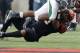 Nov 20, 2010; Princeton, NJ, USA; Dartmouth Big Green running back Dominick Pierre (29) runs over Princeton Tigers defender in route to first down. Dartmouth Big Green defeats Princeton Tigers 31-0. Mandatory Credit: Jim O'Connor-US PRESSWIRE
