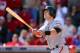 CINCINNATI, OH - OCTOBER 11: Buster Posey #28 of the San Francisco Giants hits a grand slam in the fifth inning against the Cincinnati Reds in Game Five of the National League Division Series at Great American Ball Park on October 11, 2012 in Cincinnati, Ohio. (Photo by Andy Lyons/Getty Images)