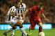 LIVERPOOL, ENGLAND - OCTOBER 04: Fabio Borini of Liverpool competes with Medhi Benatia of Udinese Calcio during the UEFA Europa League Group A match between Liverpool and Udinese at Anfield on October 4, 2012 in Liverpool, England. (Photo by Clive Brunskill/Getty Images)