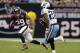 HOUSTON, TX - SEPTEMBER 30: Chris Johnson #28 of the Tennessee Titans looks for room to run against the Houston Texans at Reliant Arena at Reliant Park on September 30, 2012 in Houston, Texas. (Photo by Bob Levey/Getty Images)