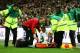 LONDON, ENGLAND - OCTOBER 12: Theo Walcott of England receives assistance after picking up an injury during the FIFA 2014 World Cup Group H qualifying match between England and San Marino at Wembley Stadium on October 12, 2012 in London, England. (Photo by Scott Heavey/Getty Images)