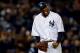 NEW YORK, NY - OCTOBER 12: CC Sabathia #52 of the New York Yankees reacts after getting out of the eighth inning against the Baltimore Orioles during Game Five of the American League Division Series at Yankee Stadium on October 12, 2012 in New York, New York. (Photo by Elsa/Getty Images)