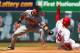 ST. LOUIS, MO - AUGUST 9: Jon Jay #19 of the St. Louis Cardinals steals second base against Marco Scutaro #19 of the San Francisco Giants at Busch Stadium on August 9, 2012 in St. Louis, Missouri. (Photo by Dilip Vishwanat/Getty Images)