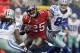 ARLINGTON, TX - SEPTEMBER 23: Aqib Talib #25 of the Tampa Bay Buccaneers returns an interception against Dwayne Harris #17 of the Dallas Cowboys and Jason Witten #82 of the Dallas Cowboys at Cowboys Stadium on September 23, 2012 in Arlington, Texas. (Photo by Tom Pennington/Getty Images)