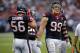 Sep 30, 2012; Houston, TX, USA; Houston Texans inside linebacker Brian Cushing (56) and defensive end J.J. Watt (99) wait for play to resume during the game against the Tennessee Titans at Reliant Stadium. The Texans defeated the Titans 38-14. Mandatory Credit: Jerome Miron-US PRESSWIRE