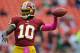 LANDOVER, MD - OCTOBER 07: Quarterback Robert Griffin III #10 of the Washington Redskins warms up before taking on the Atlanta Falcons at FedExField on October 7, 2012 in Landover, Maryland. (Photo by Patrick Smith/Getty Images)