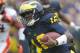 ANN ARBOR, MI - OCTOBER 13: Denard Robinson #16 of the Michigan Wolverines runs for a second quarter touchdown while playing the Illinois Fighting Illini at Michigan Stadium on October 13, 2012 in Ann Arbor, Michigan. (Photo by Gregory Shamus/Getty Images)