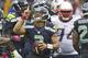 SEATTLE, WA - OCTOBER 14: Russell Wilson #3 of the Seattle Seahawks celebrates beating the New England Patriots during a game at CenturyLink Field on October 14, 2012 in Seattle, Washington. The Seahawks beat the Patriots 24-23. (Photo by Stephen Brashear/Getty Images)