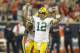 Oct 14, 2012; Houston, TX, USA; Green Bay Packers quarterback Aaron Rodgers (12) celebrates a touchdown pass against the Houston Texans in the second quarter at Reliant Stadium. Mandatory Credit: Brett Davis-US PRESSWIRE