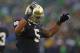 SOUTH BEND, IN - OCTOBER 13: Manti T'eo #5 of the Notre Dame Fighting Irish encourages the crowd during a game against the Stanford Cardinal at Notre Dame Stadium on October 13, 2012 in South Bend, Indiana. Notre Dame defeated Stanford 20-13 in overtime. (Photo by Jonathan Daniel/Getty Images)