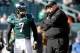 PHILADELPHIA, PA - JANUARY 01: Michael Vick (7) of the Philadelphia Eagles talks with head coach Andy Reid before the start of the Eagles game against the Washington Redskins at Lincoln Financial Field on January 1, 2012 in Philadelphia, Pennsylvania. (Photo by Rob Carr/Getty Images)