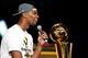 MIAMI, FL - JUNE 25: Chris Bosh #1 of the Miami Heat talks to the crowd during a rally for the 2012 NBA Champion Miami Heat at American Airlines Arena on June 25, 2012 in Miami, Florida. (Photo by Mike Ehrmann/Getty Images)