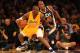 LOS ANGELES, CA - DECEMBER 27: Kobe Bryant #24 of the Los Angeles Lakers controls the ball against Raja Bell #19 of the Utah Jazz at Staples Center on December 27, 2011 in Los Angeles, California. NOTE TO USER: User expressly acknowledges and agrees that, by downloading and or using this photograph, User is consenting to the terms and conditions of the Getty Images License Agreement. (Photo by Stephen Dunn/Getty Images)