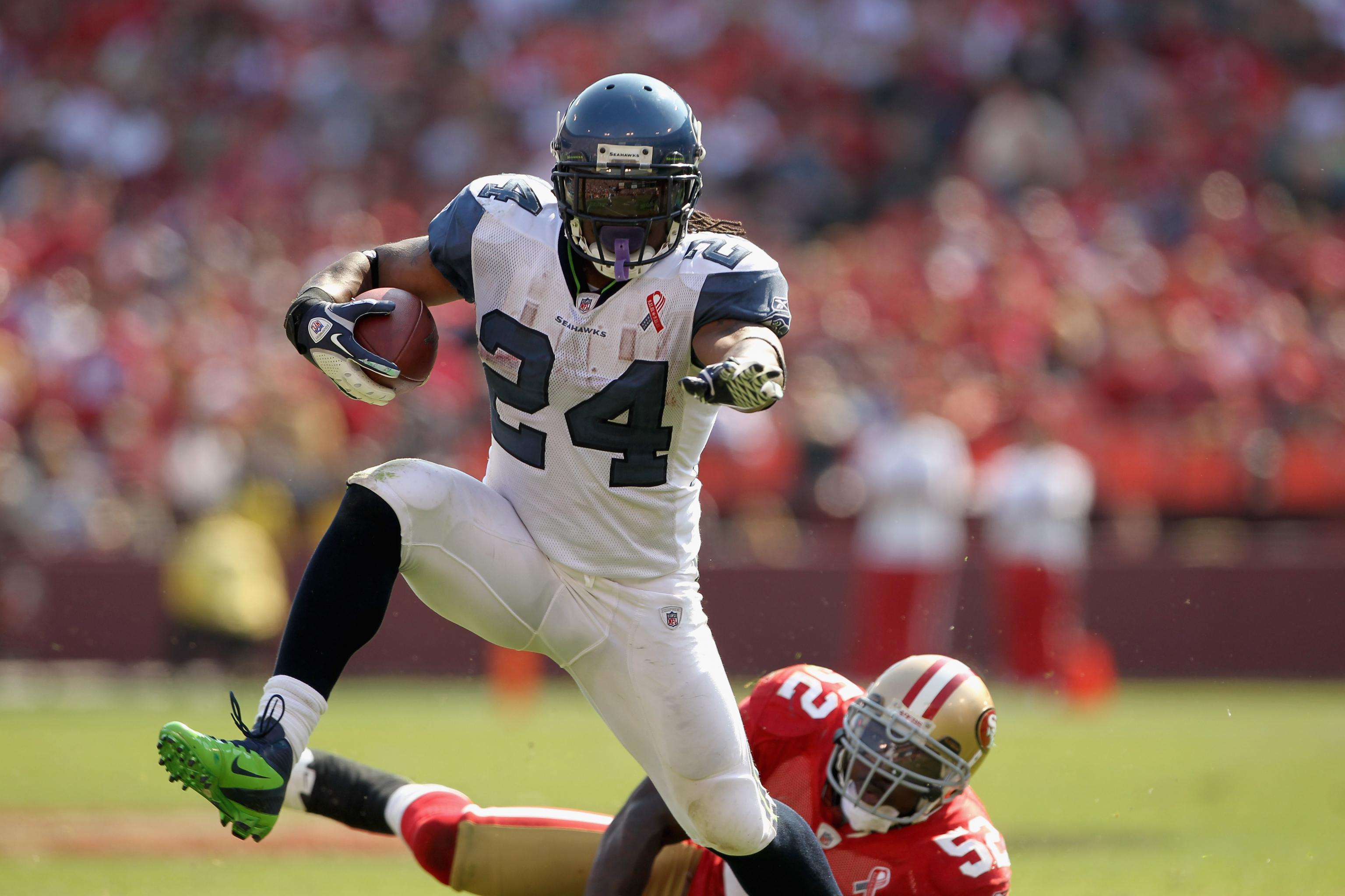 Seattle Seahawks' Marshawn Lynch (24) scores a touchdown on a 1-yard rush  against the San Franc …