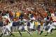 AUSTIN, TX - OCTOBER 06: Geno Smith #12 of the West Virginia Mountaineers throws the ball against the Texas Longhorns at Darrell K Royal-Texas Memorial Stadium on October 6, 2012 in Austin, Texas. (Photo by Ronald Martinez/Getty Images)