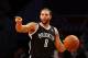 NEW YORK, NY - OCTOBER 15: Deron Williams #8 of the Brooklyn Nets carries the ball up the floor during a preseason game against the Washington Wizards at the Barclays Center on October 15, 2012 in the Brooklyn borough of New York City. NOTE TO USER: User expressly acknowledges and agrees that, by downloading and/or using this photograph, user is consenting to the terms and conditions of the Getty Images License Agreement. (Photo by Alex Trautwig/Getty Images)