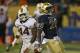 CHICAGO, IL - OCTOBER 06: Cierre Wood #20 of the Notre Dame Fighting Irish scores a touchdown past Eddie Johnson #44 of the Miami Hurricanes at Soldier Field on October 6, 2012 in Chicago, Illinois. Notre Dame defeated Miami 41-3. (Photo by Jonathan Daniel/Getty Images)