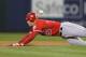 SEATTLE, WA - OCTOBER 02: Mike Trout #27 of the Los Angeles Angels of Anaheim steals second base ahead of the throw against the Seattle Mariners at Safeco Field on October 2, 2012 in Seattle, Washington. (Photo by Otto Greule Jr/Getty Images)