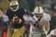 SOUTH BEND, IN - OCTOBER 13: Everett Golson #5 of the Notre Dame Fighting Irish tries to break away from Henry Anderson #91 of the Standford Cardinal at Notre Dame Stadium on October 13, 2012 in South Bend, Indiana. Notre Dame defeated Stanford 20-13 in overtime. (Photo by Jonathan Daniel/Getty Images)