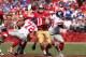 SAN FRANCISCO, CA - OCTOBER 14: Quarterback Alex Smith #11 of the San Francisco 49ers steps up out of the pocket against the New York Giants at Candlestick Park on October 14, 2012 in San Francisco, California. The Giants won 26-3. (Photo by Stephen Dunn/Getty Images)